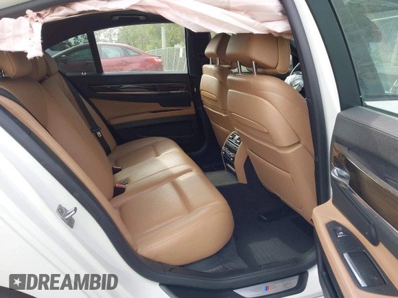 2013 BMW 7 Series 740i with VIN WBAYA6C52DD143862, listed as a IAAI auction lot 41859183 with 133,666 mi miles. Bid and sale history available at carsss.com. Image 8.