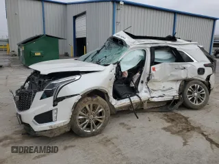 2021 Cadillac XT5 FWD Premium Luxury z VIN 1GYKNCR41MZ154357, wystawiony jako Copart lot #86819564 z przebiegiem Nie podano mil oraz Nie do naprawy • Non repairable. Historia ofert i sprzedaży dostępna na DreamBid. Obrazek 1.