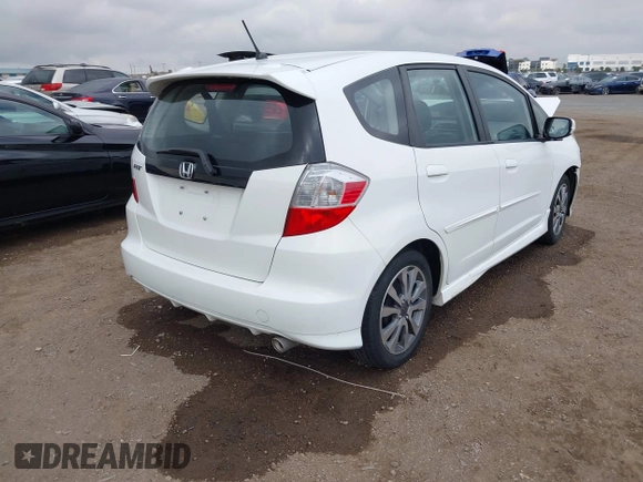 2012 Honda Fit Sport with VIN JHMGE8H59CC001907, listed as a IAAI auction lot 41532788 with 75,917 mi miles. Bid and sale history available at carsss.com. Image 4.