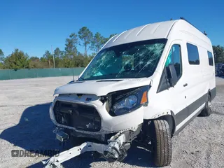2022 Ford Transit Cargo with VIN 1FTBW3U85NKA01097, listed as a IAAI auction lot 41076643 with 24,786 mi miles and . Bid and sale history available at DreamBid. Image 17.