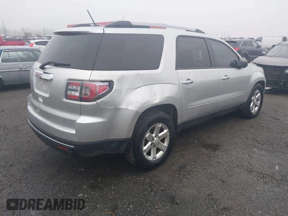2014 GMC Acadia SLE with VIN 1GKKRNED9EJ365970, listed as a IAAI auction lot 41933354 with 172,232 mi miles and . Bid and sale history available at carsss.com. Image 4.