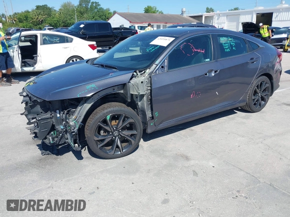 2019 Honda Civic Sport with VIN 19XFC2F89KE019683, listed as a IAAI auction lot 42055871 with 107,941 mi miles and . Bid and sale history available at DreamBid. Image 18.
