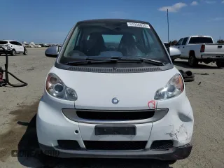 2012 Smart fortwo Pure z VIN WMEEJ3BA9CK561933, wystawiony jako Copart lot #53356835 z przebiegiem 67 587 mil mil oraz Nie do naprawy • Non repairable. Historia ofert i sprzedaży dostępna na DreamBid. Obrazek 5.