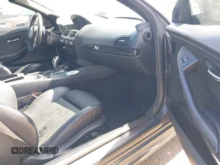 2009 BMW 6 Series 650i z VIN WBAEB53539CX64230, wystawiony jako IAAI lot #41827275 z przebiegiem 108 260 mil mil oraz . Historia ofert i sprzedaży dostępna na DreamBid. Obrazek 5.