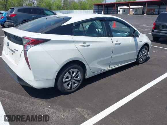 2017 Toyota Prius Two with VIN JTDKARFU7H3054054, listed as a IAAI auction lot 42028565 with 64,805 mi miles. Bid and sale history available at carsss.com. Image 4.