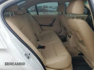 2009 BMW 3 Series 328i with VIN WBAPH77599NM31774, listed as a Copart auction lot 52669315 with 241,355 mi miles and Salvage title. Bid and sale history available at DreamBid. Image 10.