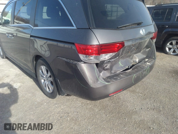 2014 Honda Odyssey EX-L with VIN 5FNRL5H64EB037646, listed as a IAAI auction lot 41786768 with 116,491 mi miles and . Bid and sale history available at carsss.com. Image 6.