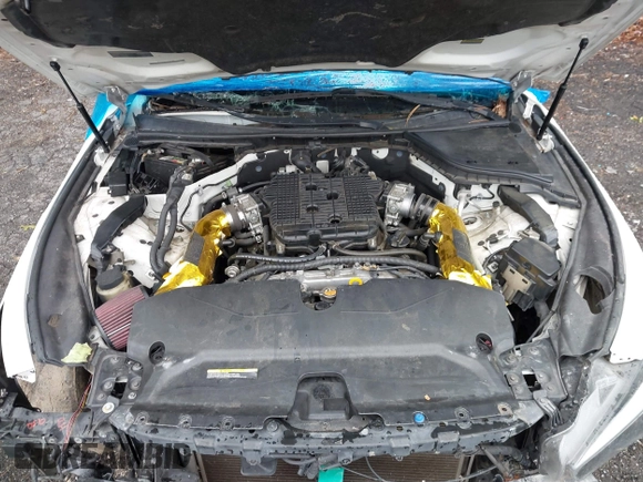 2014 Infiniti Q50 Premium with VIN JN1BV7AP4EM691857, listed as a IAAI auction lot 42372219 with 177,021 mi miles and . Bid and sale history available at DreamBid. Image 10.