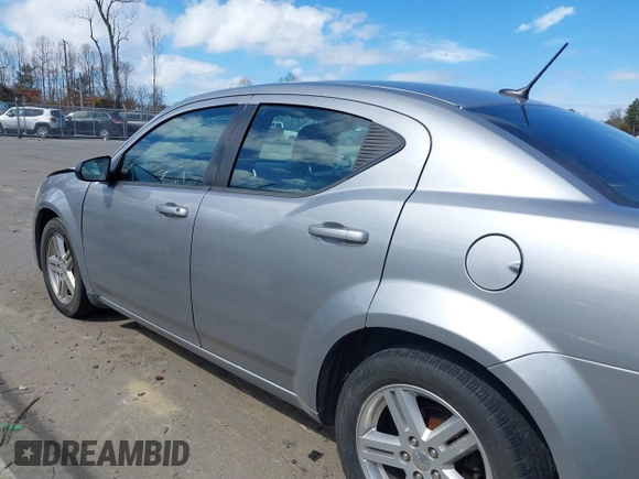 2013 Dodge Avenger SE V6 with VIN 1C3CDZAG2DN696519, listed as a IAAI auction lot 41705189 with 154,573 mi miles and . Bid and sale history available at DreamBid. Image 14.