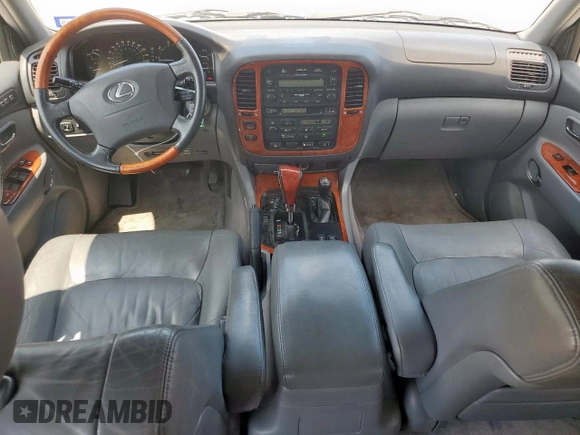 2001 Lexus LX 470 z VIN JTJHT00W313504330, wystawiony jako Copart lot #61126435 z przebiegiem 87 049 mil mil oraz Czysty tytuł • Clean title. Historia ofert i sprzedaży dostępna na DreamBid. Obrazek 8.