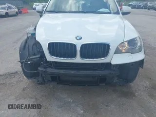 2011 BMW X5 35i z VIN 5UXZV4C55BL739890, wystawiony jako IAAI lot #42268402 z przebiegiem 82 719 mil mil oraz . Historia ofert i sprzedaży dostępna na DreamBid. Obrazek 13.