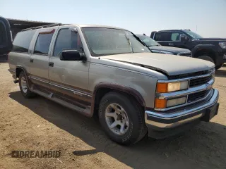 1999 Chevrolet Suburban with VIN 3GNEC16R2XG144591, listed as a Copart auction lot 65368364 with 244,605 mi miles and Non Repairable. Bid and sale history available at carsss.com. Image 4.