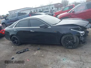 2014 Cadillac CTS Vsport Premium RWD z VIN 1G6AV5S8XE0143389, wystawiony jako IAAI lot #42021009 z przebiegiem 95 102 mil mil oraz . Historia ofert i sprzedaży dostępna na DreamBid. Obrazek 13.