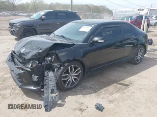 2015 Scion tC z VIN JTKJF5C75FJ012021, wystawiony jako IAAI lot #42143878 z przebiegiem 127 235 mil mil oraz . Historia ofert i sprzedaży dostępna na DreamBid. Obrazek 16.