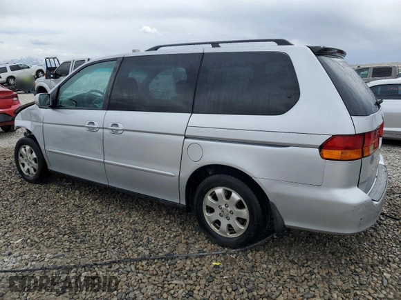 2004 Honda Odyssey EX-RES z VIN 5FNRL18804B121844, wystawiony jako Copart lot #53390135 z przebiegiem 284 065 mil mil oraz Szkoda całkowita • Salvage title. Historia ofert i sprzedaży dostępna na DreamBid. Obrazek 2.