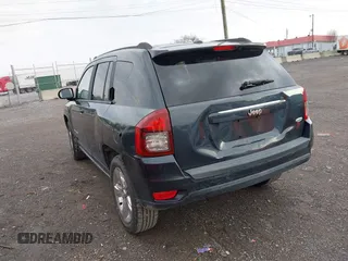 2014 Jeep Compass High Altitude with VIN 1C4NJCEA9ED647552, listed as a IAAI auction lot 41954070 with 110,474 mi miles. Bid and sale history available at carsss.com. Image 3.