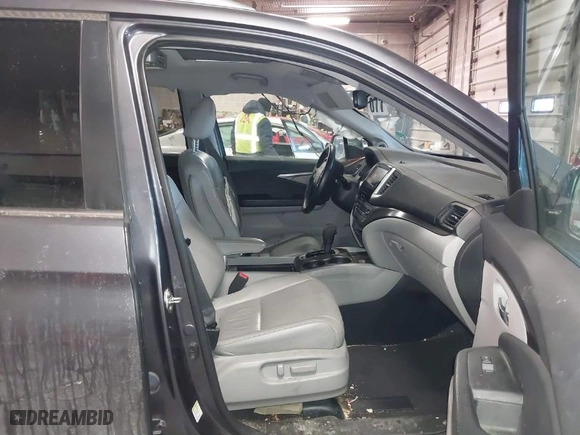 2016 Honda Pilot EX-L with VIN 5FNYF6H55GB103141, listed as a IAAI auction lot 41535841 with 129,231 mi miles. Bid and sale history available at carsss.com. Image 5.