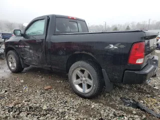 2012 Ram 1500 Express with VIN 3C6JD7ATXCG278339, listed as a Copart auction lot 45185215 with 122,129 mi miles and Salvage Title. Bid and sale history available at carsss.com. Image 2.