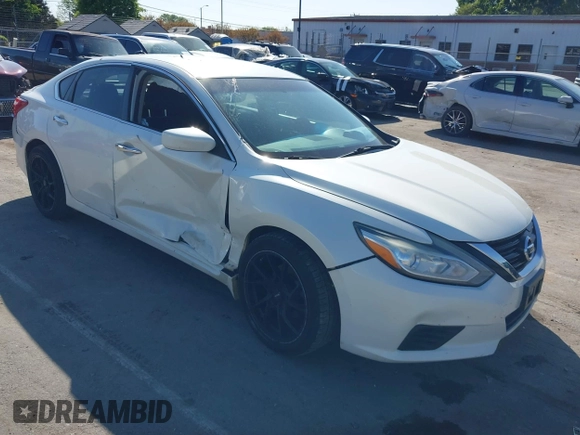2016 Nissan Altima SR with VIN 1N4AL3AP0GC187327, listed as a IAAI auction lot 42001667 with 175,649 mi miles and . Bid and sale history available at carsss.com. Image 1.