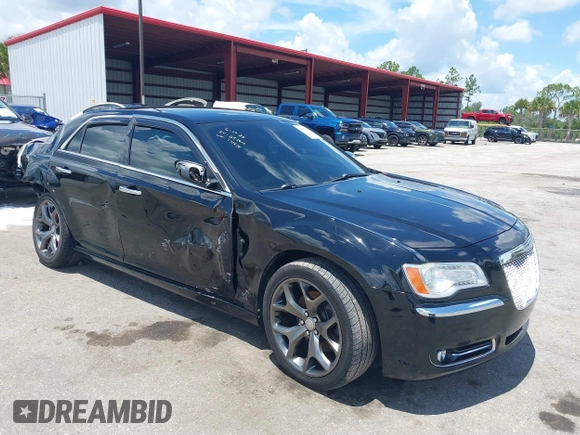 2014 Chrysler 300 C with VIN 2C3CCAKT9EH171614, listed as a IAAI auction lot 39747704 with 129,156 mi miles and . Bid and sale history available at carsss.com. Image 1.
