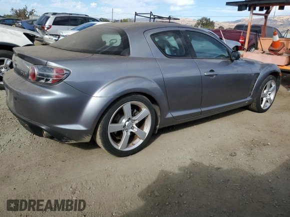 2004 Mazda RX-8 with VIN JM1FE17N240117619, listed as a Copart auction lot 77235454 with 121,887 mi miles and Clean Title. Bid and sale history available at carsss.com. Image 3.