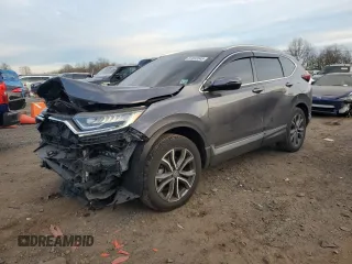2021 Honda CR-V Touring with VIN 2HKRW2H94MH641388, listed as a Copart auction lot 87692045 with 56,145 mi miles and Salvage Title. Bid and sale history available at carsss.com. Image 1.