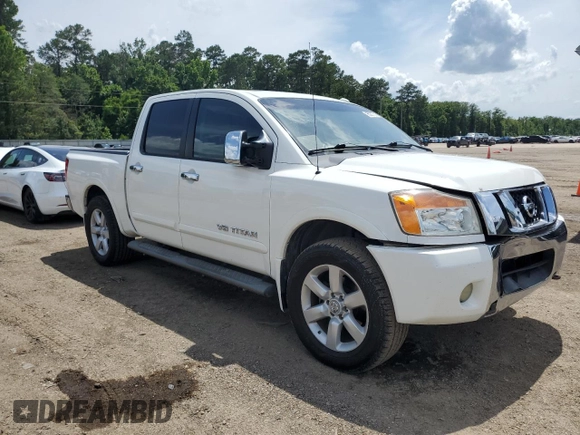 2010 Nissan Titan SE with VIN 1N6BA0ED1AN323167, listed as a Copart auction lot 60237535 with 135,182 mi miles and Salvage title. Bid and sale history available at DreamBid. Image 4.