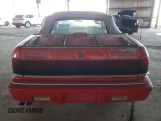 1990 Chrysler LeBaron z VIN 1C3XJ45J9LG405682, wystawiony jako Copart lot #48690985 z przebiegiem 75 714 mil mil oraz Tytuł czysty. Historia ofert i sprzedaży dostępna na DreamBid. Obrazek 6.
