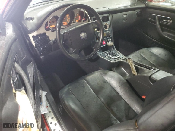 1999 Mercedes-Benz SLK-Class with VIN WDBKK47F1XF106192, listed as a Copart auction lot 85040874 with 190,128 mi miles and Salvage Title. Bid and sale history available at carsss.com. Image 8.