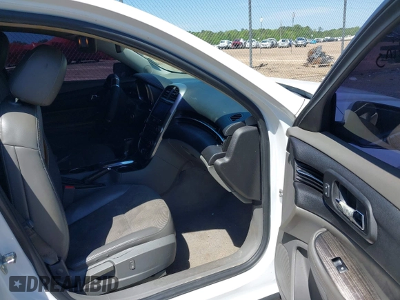 2016 Chevrolet Malibu LT with VIN 1G11C5SAXGU143550, listed as a IAAI auction lot 42005961 with 316,391 mi miles and . Bid and sale history available at DreamBid. Image 5.
