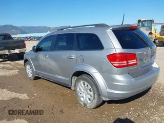 2019 Dodge Journey SE Value with VIN 3C4PDCAB3KT746548, listed as a IAAI auction lot 40202083 with 150,699 mi miles and . Bid and sale history available at DreamBid. Image 3.