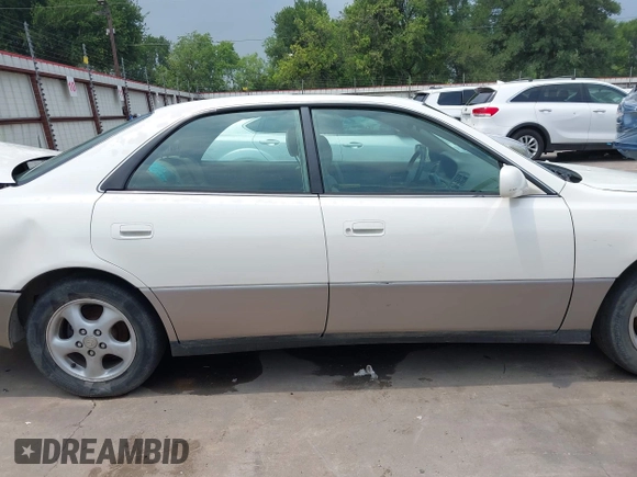 1998 Lexus ES 300 with VIN JT8BF28GXW0106483, listed as a IAAI auction lot 42177092 with Not provided miles and . Bid and sale history available at DreamBid. Image 14.