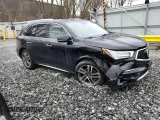 2017 Acura MDX Advance with VIN 5FRYD4H87HB029533, listed as a Copart auction lot 51931625 with 102,962 mi miles and Salvage title. Bid and sale history available at DreamBid. Image 4.