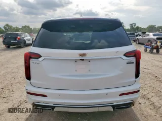 2020 Cadillac XT6 FWD Premium Luxury z VIN 1GYKPCRS9LZ107178, wystawiony jako Copart lot #58789335 z przebiegiem 154 428 mil mil oraz Nie do naprawy. Historia ofert i sprzedaży dostępna na DreamBid. Obrazek 6.