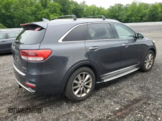 2016 Kia Sorento SX z VIN 5XYPKDA51GG152979, wystawiony jako Copart lot #57942165 z przebiegiem 189 283 mil mil oraz Szkoda całkowita • Salvage title. Historia ofert i sprzedaży dostępna na DreamBid. Obrazek 3.
