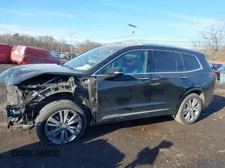 2023 Cadillac XT6 FWD Premium Luxury with VIN 1GYKPCRS1PZ105964, listed as a IAAI auction lot 41525039 with 70,603 mi miles and . Bid and sale history available at DreamBid. Image 20.