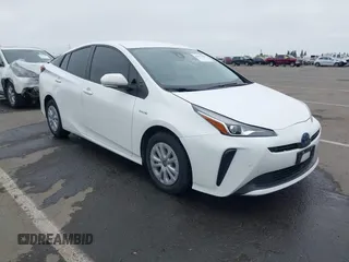 2021 Toyota Prius L Eco with VIN JTDKAMFU3M3152608, listed as a IAAI auction lot 42077367 with 112,296 mi miles and . Bid and sale history available at DreamBid. Image 1.
