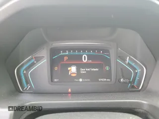 2021 Honda Odyssey Touring z VIN 5FNRL6H85MB039444, wystawiony jako Copart lot #57142205 z przebiegiem 74 228 mil mil oraz Szkoda całkowita • Salvage title. Historia ofert i sprzedaży dostępna na DreamBid. Obrazek 9.