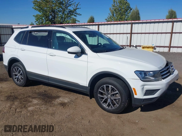 2020 Volkswagen Tiguan SE with VIN 3VV2B7AXXLM053170, listed as a IAAI auction lot 42203372 with 112,794 mi miles and . Bid and sale history available at DreamBid. Image 1.