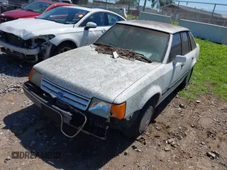 1989 Ford Escort z VIN 1FAPP9591KT185723, wystawiony jako IAAI lot #42257967 z przebiegiem 318 953 mil mil oraz . Historia ofert i sprzedaży dostępna na DreamBid. Obrazek 2.
