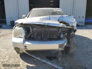 2009 Jeep Grand Cherokee Laredo with VIN 1J8GS48KX9C514254, listed as a Copart auction lot 49809175 with 293,040 mi miles and Salvage Title. Bid and sale history available at carsss.com. Image 5.