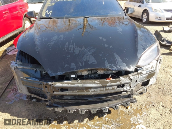 2014 Tesla Model S 60 with VIN 5YJSA1H1XEFP34226, listed as a IAAI auction lot 41806604 with 216,021 mi miles and . Bid and sale history available at DreamBid. Image 6.