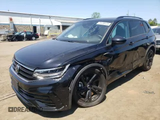 2023 Volkswagen Tiguan SE R-Line Black with VIN 3VV8B7AX2PM121851, listed as a Copart auction lot 59206135 with 23,723 mi miles and Salvage title. Bid and sale history available at DreamBid. Image 1.