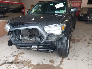 2020 Toyota Tacoma SR with VIN 3TYRX5GN5LT005461, listed as a IAAI auction lot 42020692 with 71,548 mi miles and . Bid and sale history available at DreamBid. Image 6.