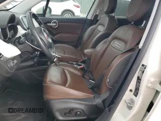 2017 FIAT 500X Lounge z VIN ZFBCFXDB6HP622947, wystawiony jako Copart lot #44979985 z przebiegiem 57 373 mil mil oraz Szkoda całkowita • Salvage title. Historia ofert i sprzedaży dostępna na DreamBid. Obrazek 7.