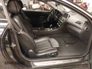 2012 BMW 6 Series 650i xDrive with VIN WBALX5C57CC894205, listed as a IAAI auction lot 41591874 with 110,932 mi miles. Bid and sale history available at carsss.com. Image 5.