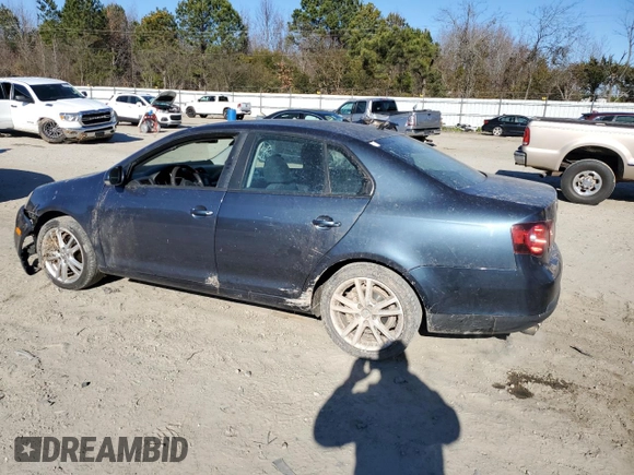 2010 Volkswagen Jetta S with VIN 3VWJX7AJ8AM007693, listed as a Copart auction lot 86056024 with 198,492 mi miles and Salvage title. Bid and sale history available at DreamBid. Image 2.