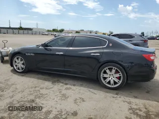 2016 Maserati Quattroporte S with VIN ZAM56RPA8G1173093, listed as a Copart auction lot 48932213 with 105,098 mi miles. Bid and sale history available at carsss.com. Image 2.