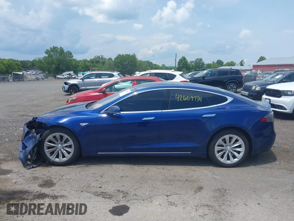 2016 Tesla Model S 70 with VIN 5YJSA1E17GF149479, listed as a IAAI auction lot 42609734 with 175,007 mi miles and . Bid and sale history available at DreamBid. Image 14.