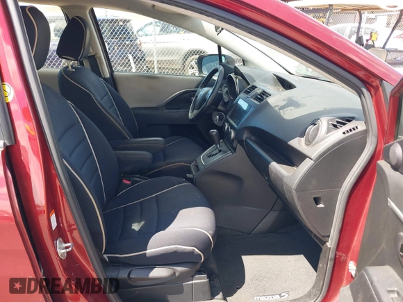 2012 Mazda 5 Touring with VIN JM1CW2CLXC0113181, listed as a IAAI auction lot 42653061 with 94,441 mi miles and . Bid and sale history available at DreamBid. Image 5.